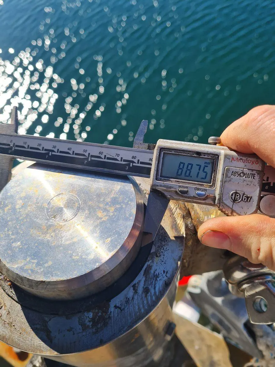 Checking a stainless component on the water at Port Stephens