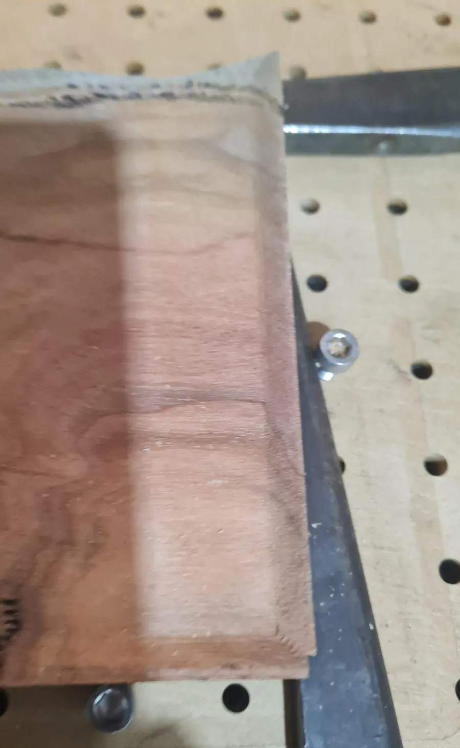 A finished hardwood board off the machine